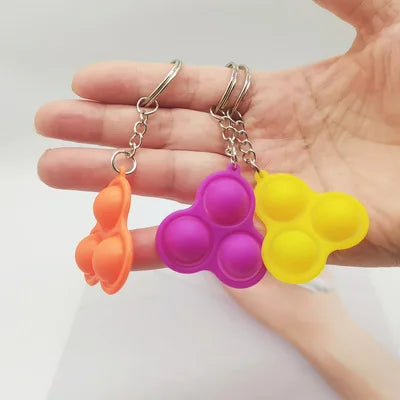 1PCS Explosive color silicone rodent control pioneer keychain decompression key chain bag pendant activity gift gift wholesale