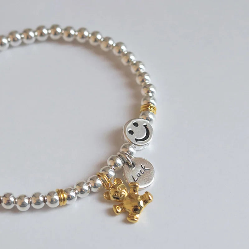 QMCOCO Unique Creative Silver Color Round Pendant Smile Face Bear Round Bead Bracelet Women New Korean Fashion Hand Ornaments