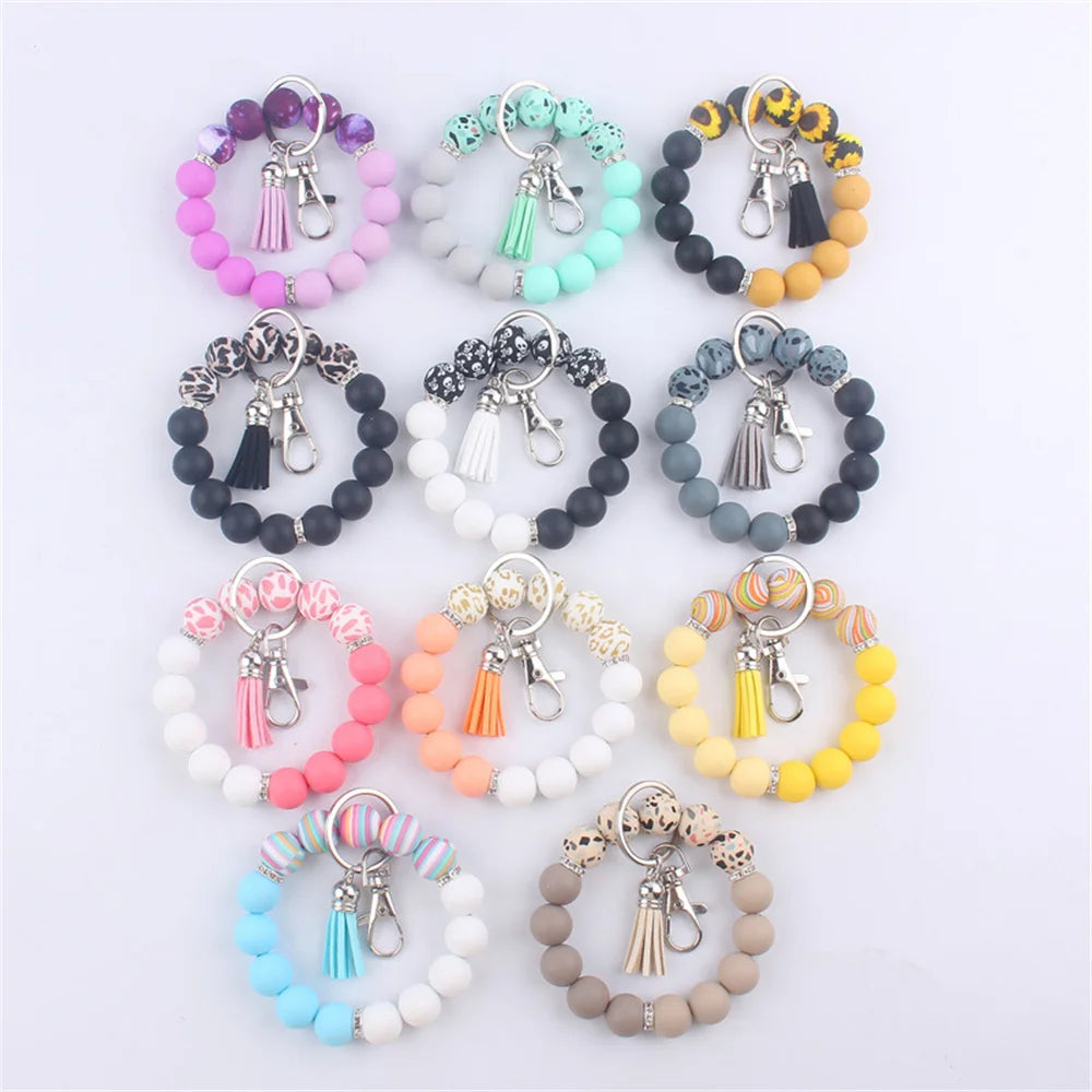 New Silicone Wrist Keychain Pendant PU Leather Small Tassel Print Leopard Print Beaded Backpack Car Keychain Accessories