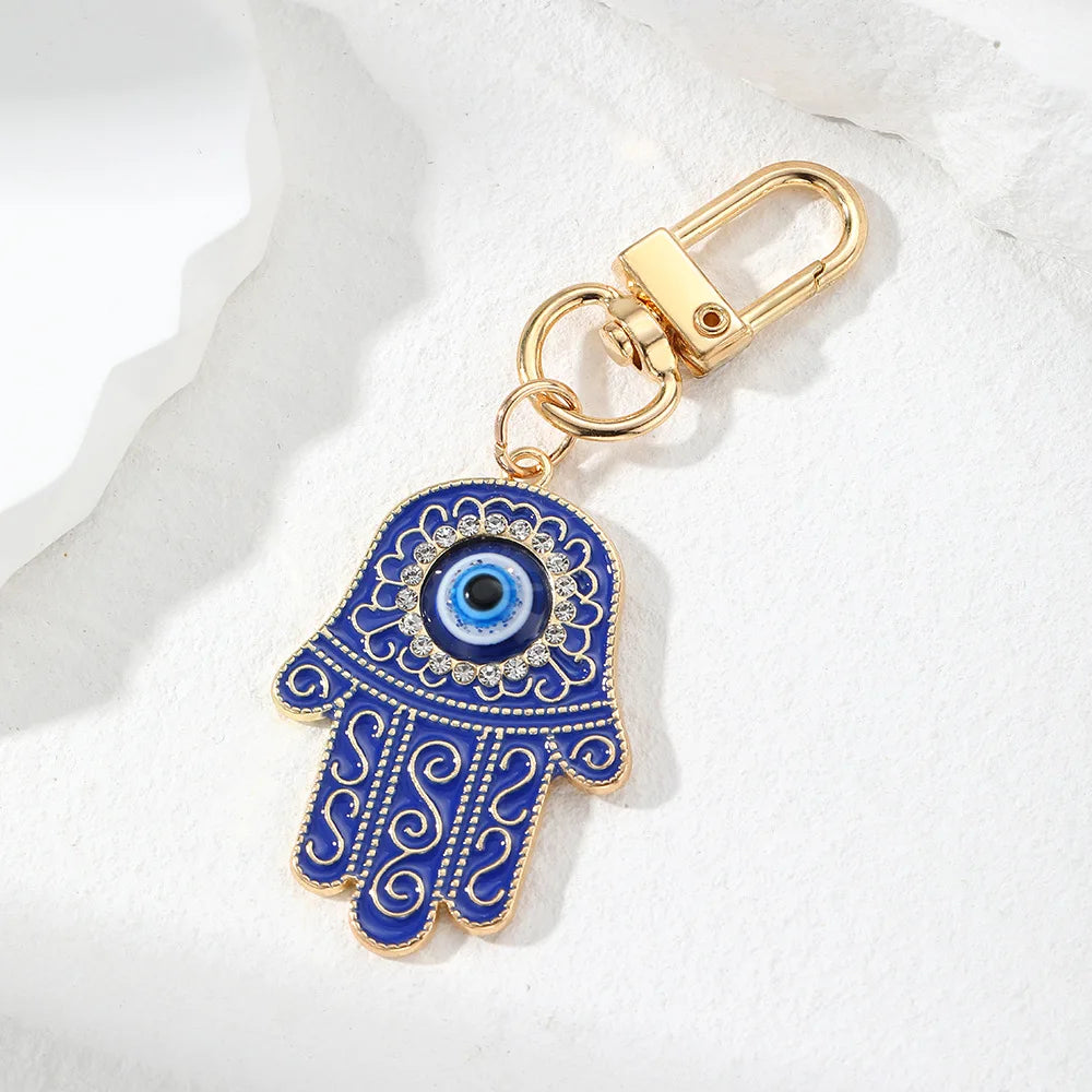 Retro Ethnic Style Personality Totem Hand Keychain Zircon Hand Blue Eye Bag Car Airpods Case Key Accessories