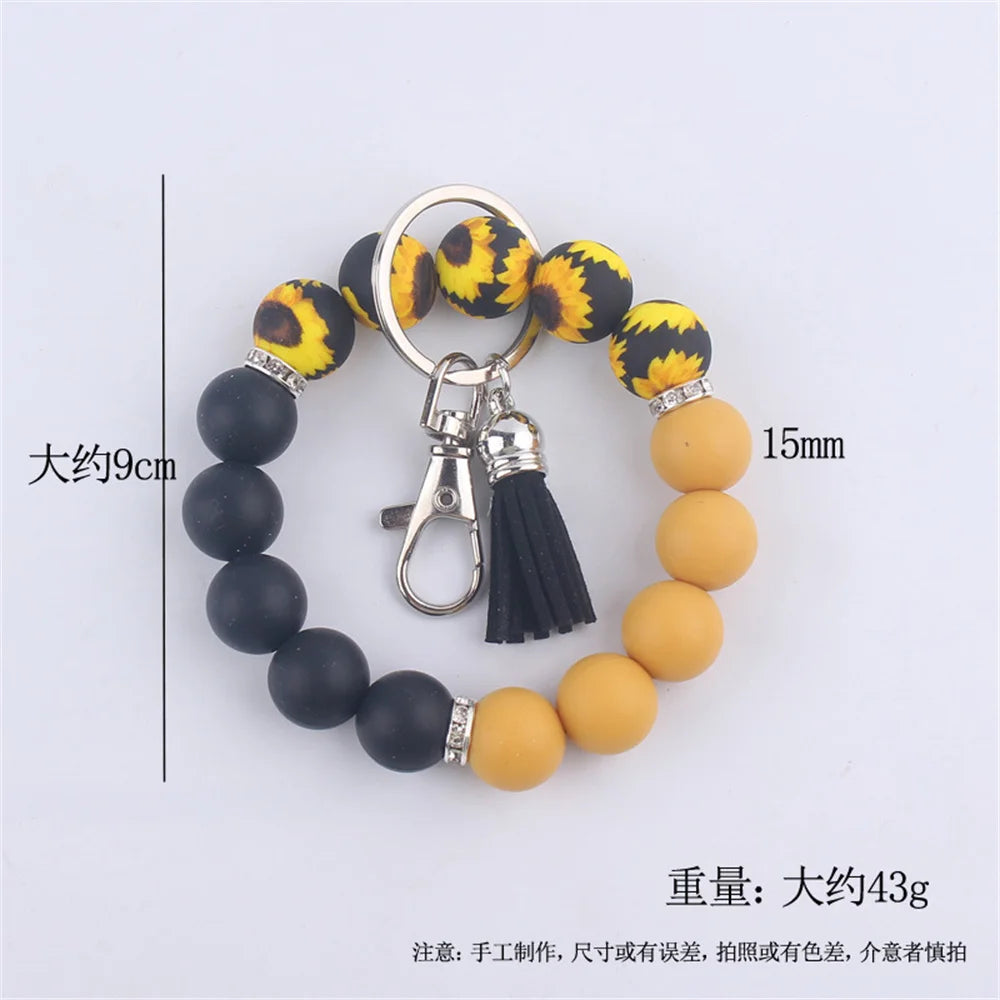 New Silicone Wrist Keychain Pendant PU Leather Small Tassel Print Leopard Print Beaded Backpack Car Keychain Accessories