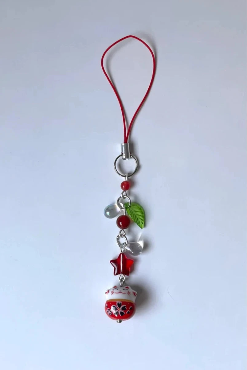 Hemasa Red Colour Red lucky cat phone charm | phone accessories | cat charm | leaf charm beaded phone charm