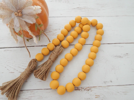 Golden yellow colour wooden beaded garland