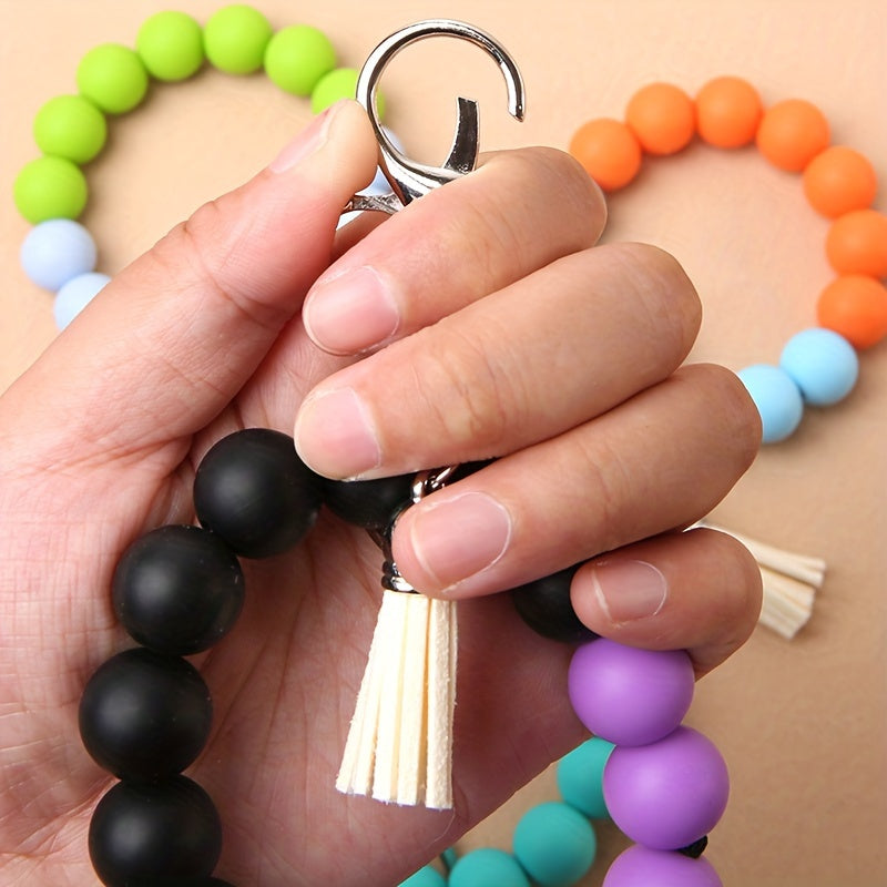 1pc Elastic Keychain Bracelet Wristband, Fashionable Silicone Beaded Keychain Bracelet, Tassel Keychain Bracelet Beaded Wristband Keychain Portable Home Car Key Ring Holder