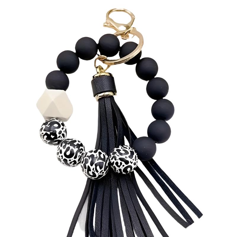 Hemasa Black Leopard White Bottom Wooden Beads Rubber Paint Round Beads PU Tassel Bangle Keychain