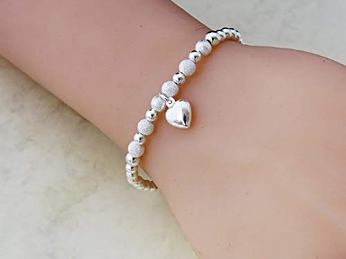 Silver Colour Round Beads With Star Dust Beads Heart Charms Stretchable Bracelet