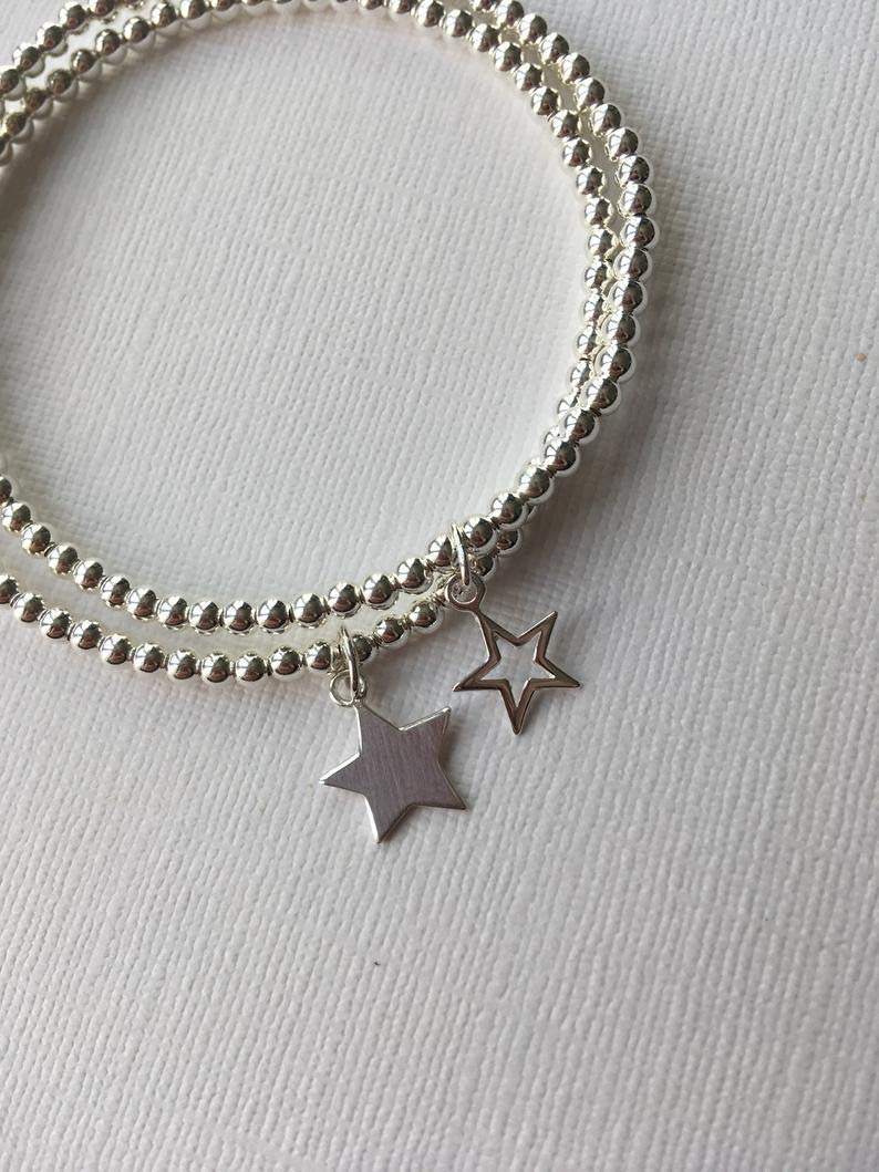 Silver Colour Stretchable Bracelets With Stars(Set of 2)