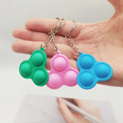 1PCS  Explosive color silicone rodent control pioneer keychain decompression key chain bag pendant activity gift gift wholesale
