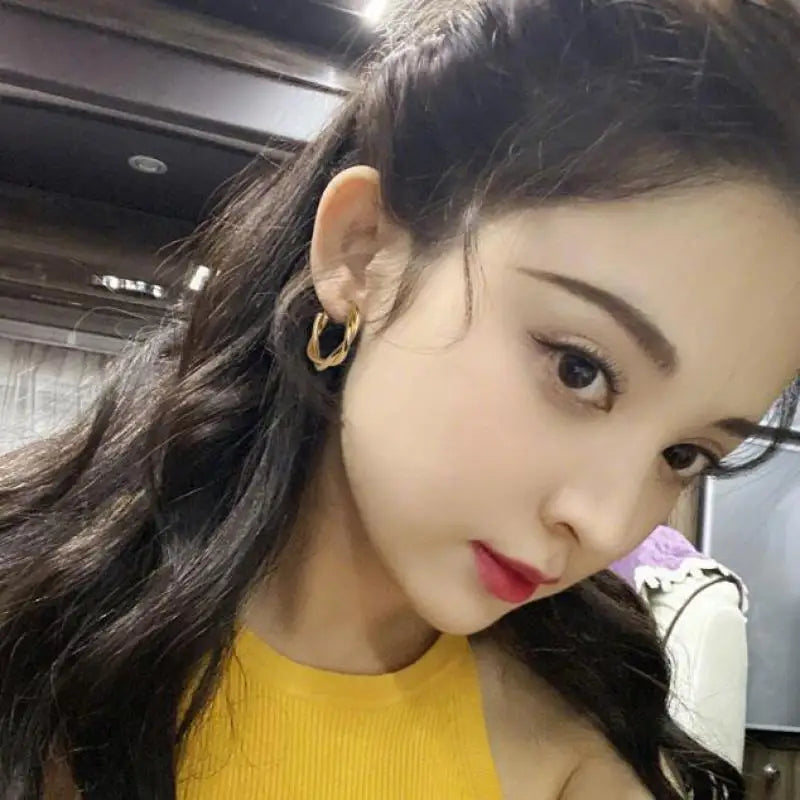 Hemasa  Silver Fashion Geometric Twist  Metal Earrings