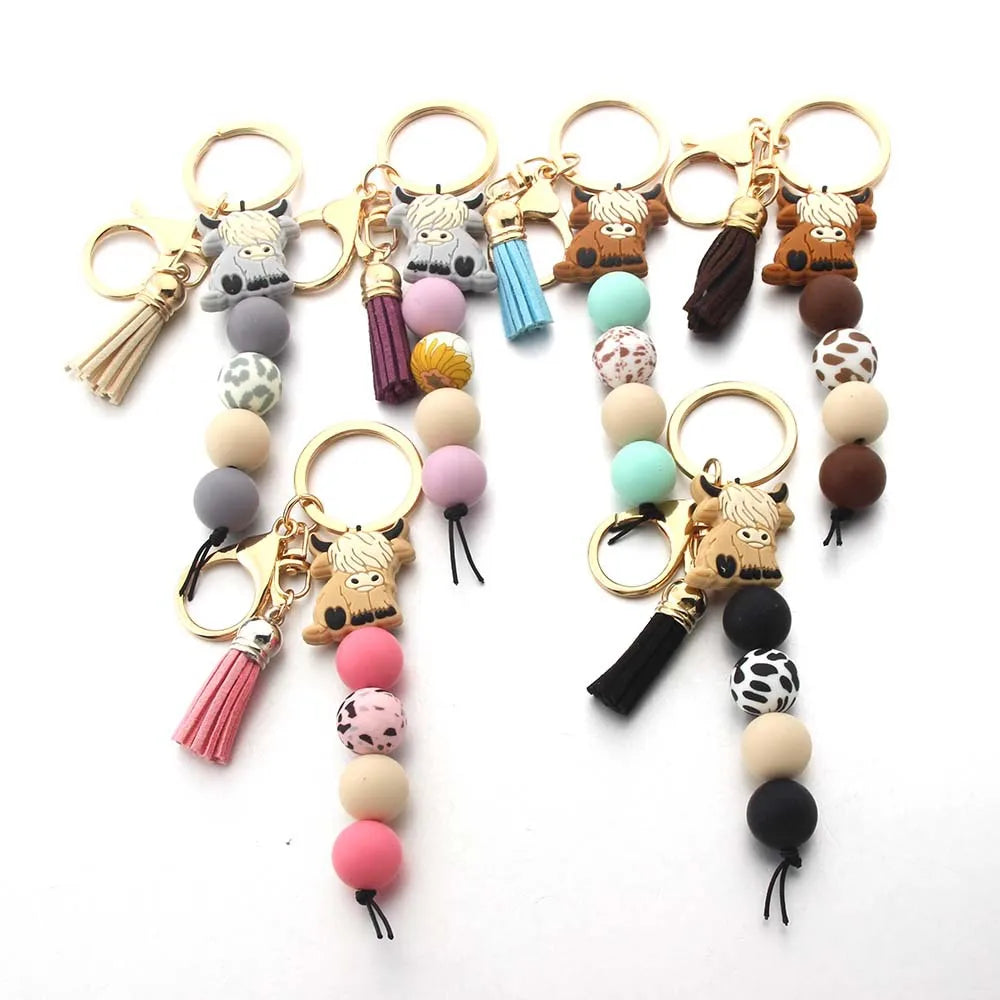 Hemasa  New Cartoon Silicone Cowboy Bead Pendant Keyring for women