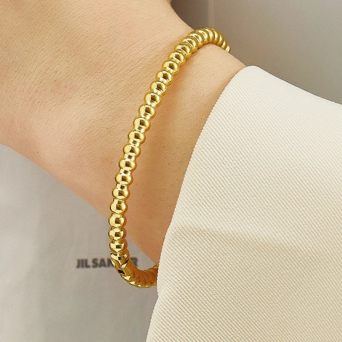 Hemasa  Gold and Silver Round Ball Beaded Bracelets Bangles / Stainless Steel Twist Balls Dots Bead Bangle for Women Jewelry