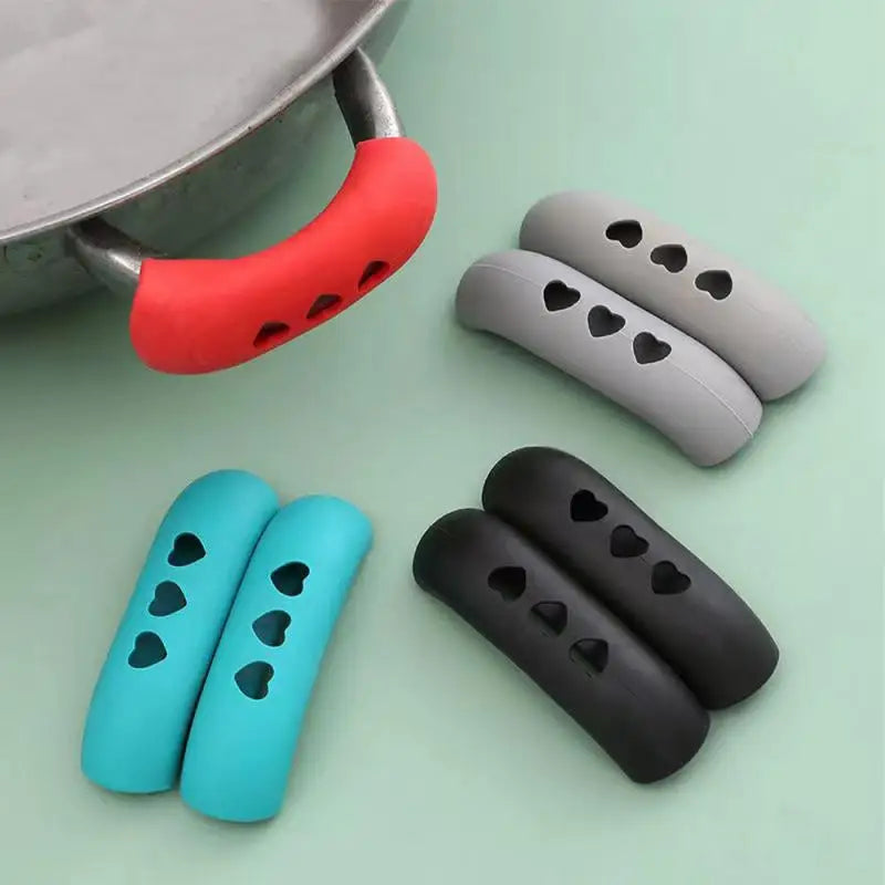 Hemasa 2 pair s Silicone Pot Earmuff Kitchen Tools Pan Accessories Pan Handle Heat Insulation Pad Buckle Pan Handle Cover