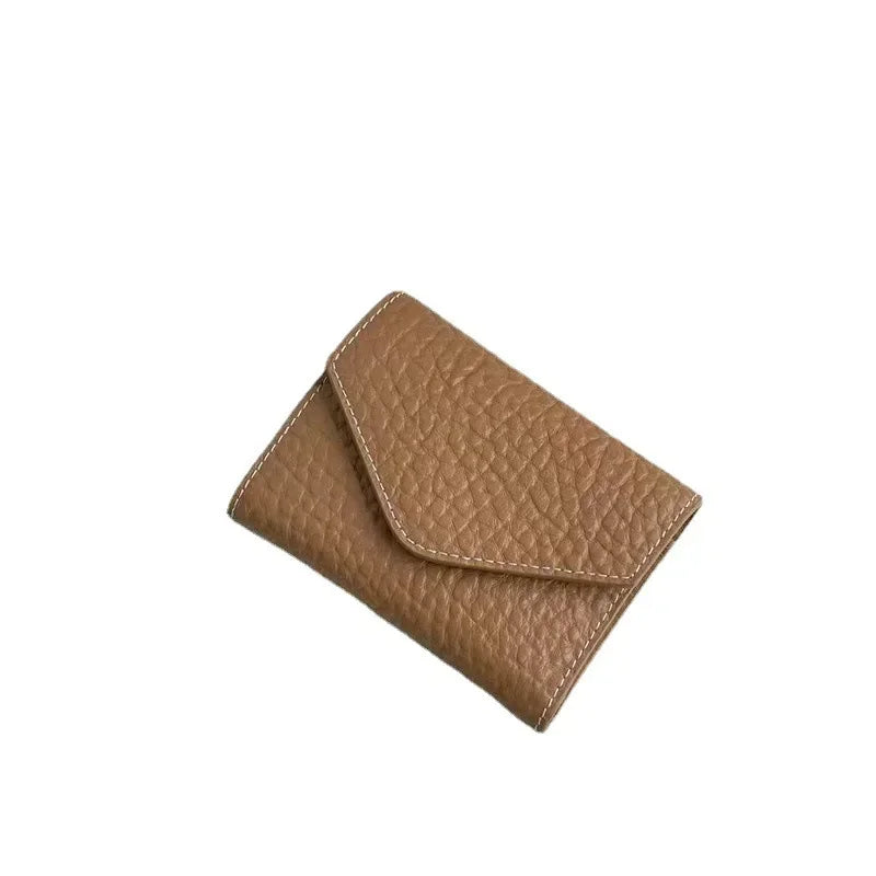 Guangzhou Wallet 2024 new leather elephant pattern three fold money clip layer cowhide coin wallet with all the short card bag
