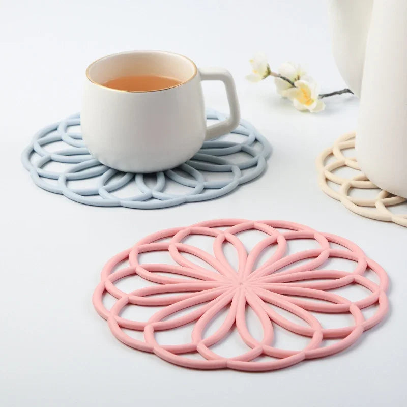 Hemasa 4 Pieces Rubber Trivet Mat Heat Insulating Hollow Flower Pot Pads