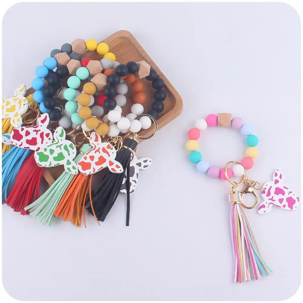 Hemasa Colorful Silicone Round Beads Keychain Cartoon Cow Head with  Wooden Sign Keyring For Women Bracelet Tassel Pendant Key Chain
