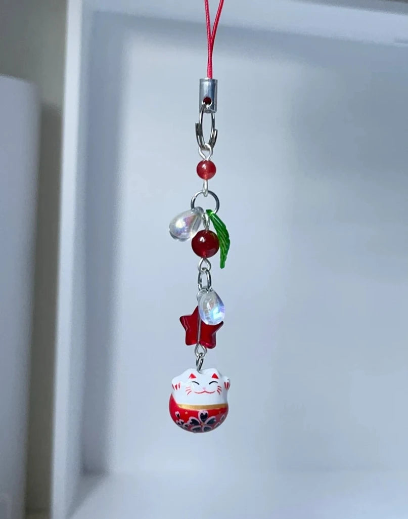 Hemasa Red Colour Red lucky cat phone charm | phone accessories | cat charm | leaf charm  beaded phone charm