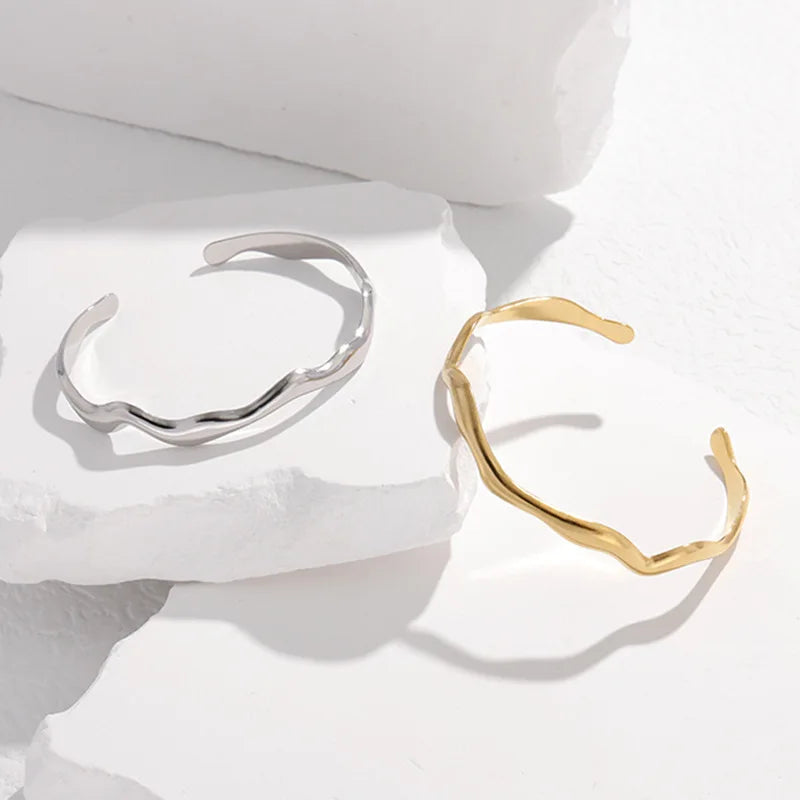 Hemasa  Stainless Steel Wavy C-Shape Cuff Bracelet For Women