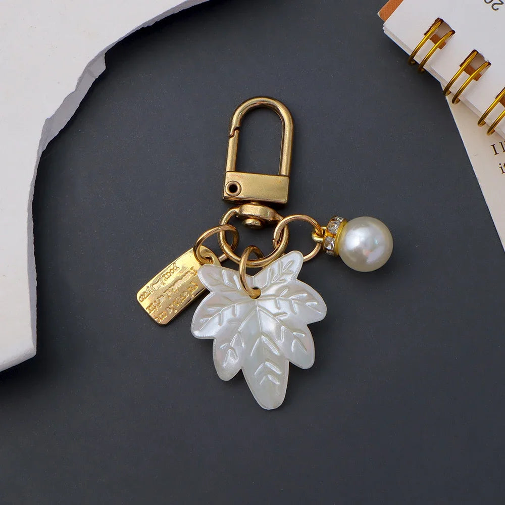 Elegant Pearl Keychain Luxury Shell Flower Leaf Pearl Keyring Handbag Charm DIY Car Key Accessories for Women Stylish Gift