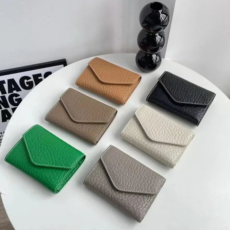 Guangzhou Wallet 2024 new leather elephant pattern three fold money clip layer cowhide coin wallet with all the short card bag