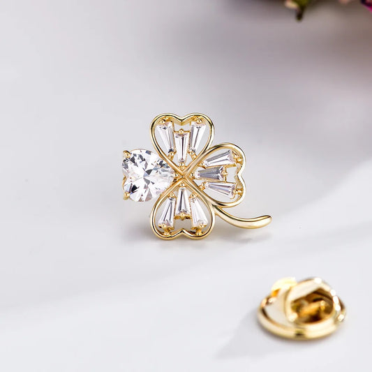 Simple and fashionable small fragrant four-leaf clover horse needle micro-inlaid zircon copper plated real gold lapel pin