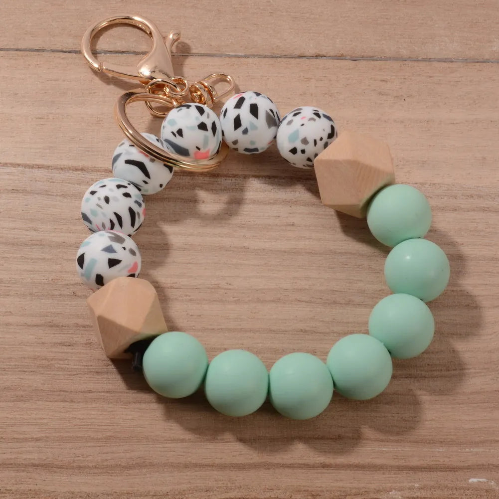 New Design Luxury Camouflage Silicone Bead Wrist Keychain Women Wood Bead Bracelet Keyrain For Car Keys Bag Pendant Friends Gift