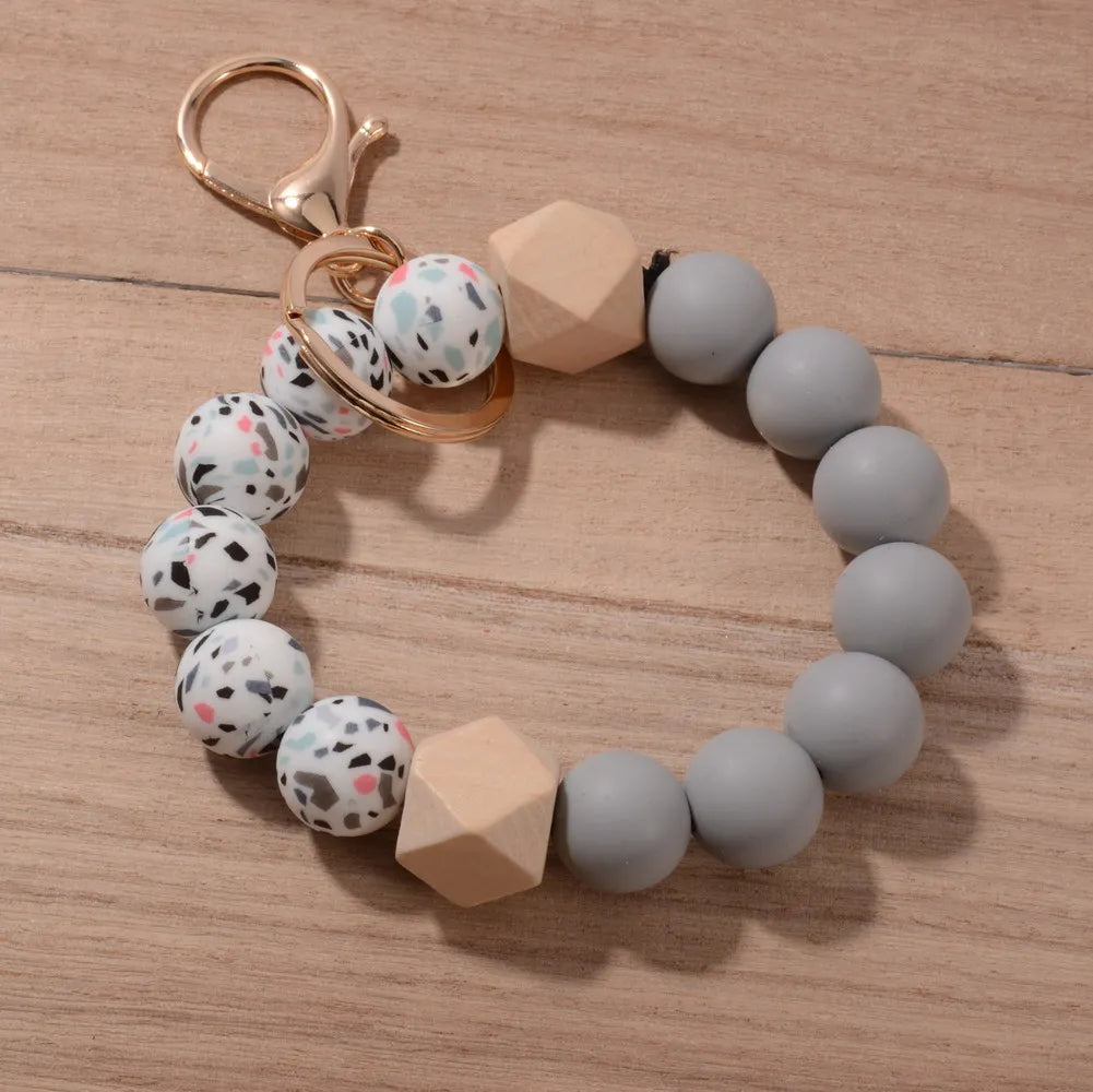 New Design Luxury Camouflage Silicone Bead Wrist Keychain Women Wood Bead Bracelet Keyrain For Car Keys Bag Pendant Friends Gift