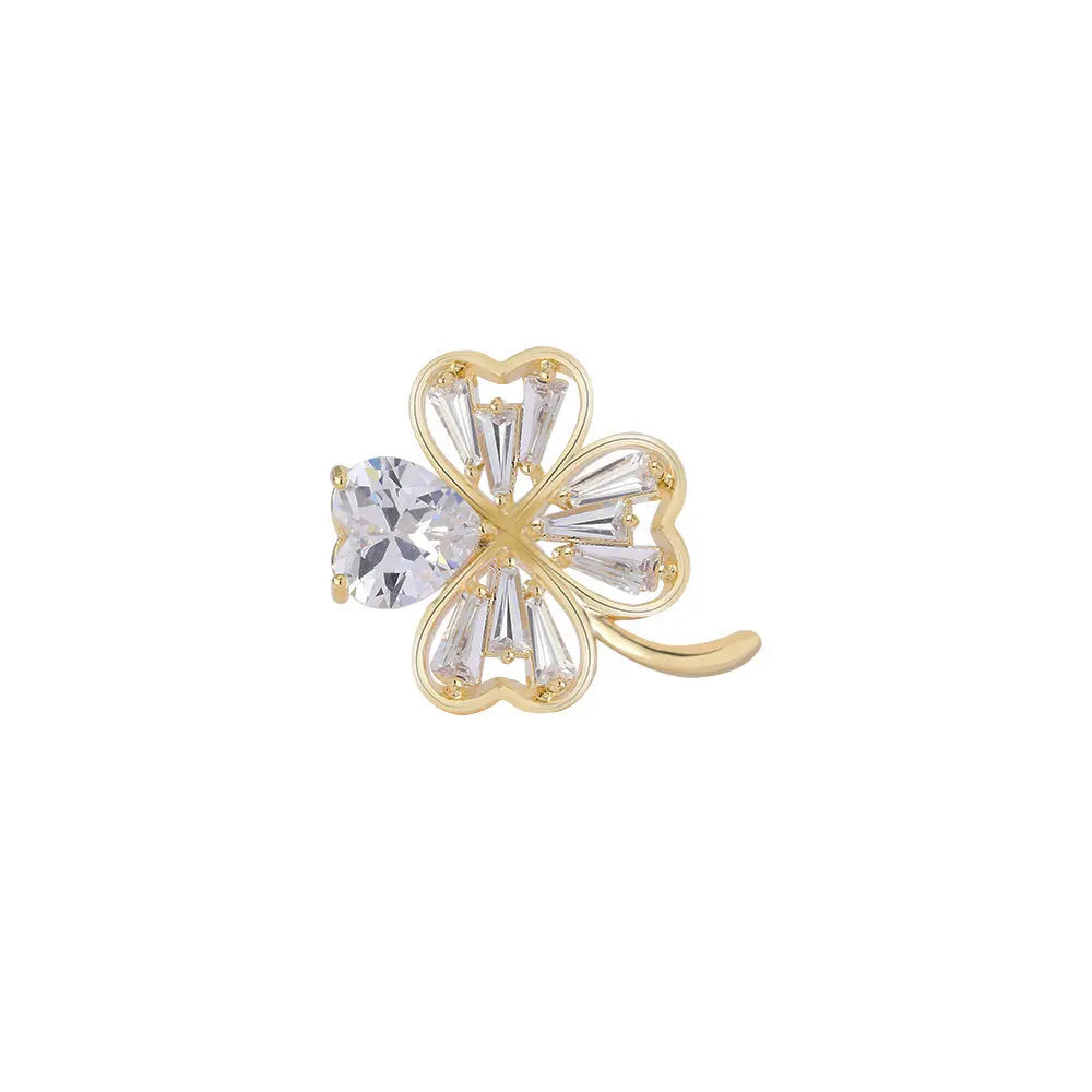 Simple and fashionable small fragrant four-leaf clover horse needle micro-inlaid zircon copper plated real gold lapel pin