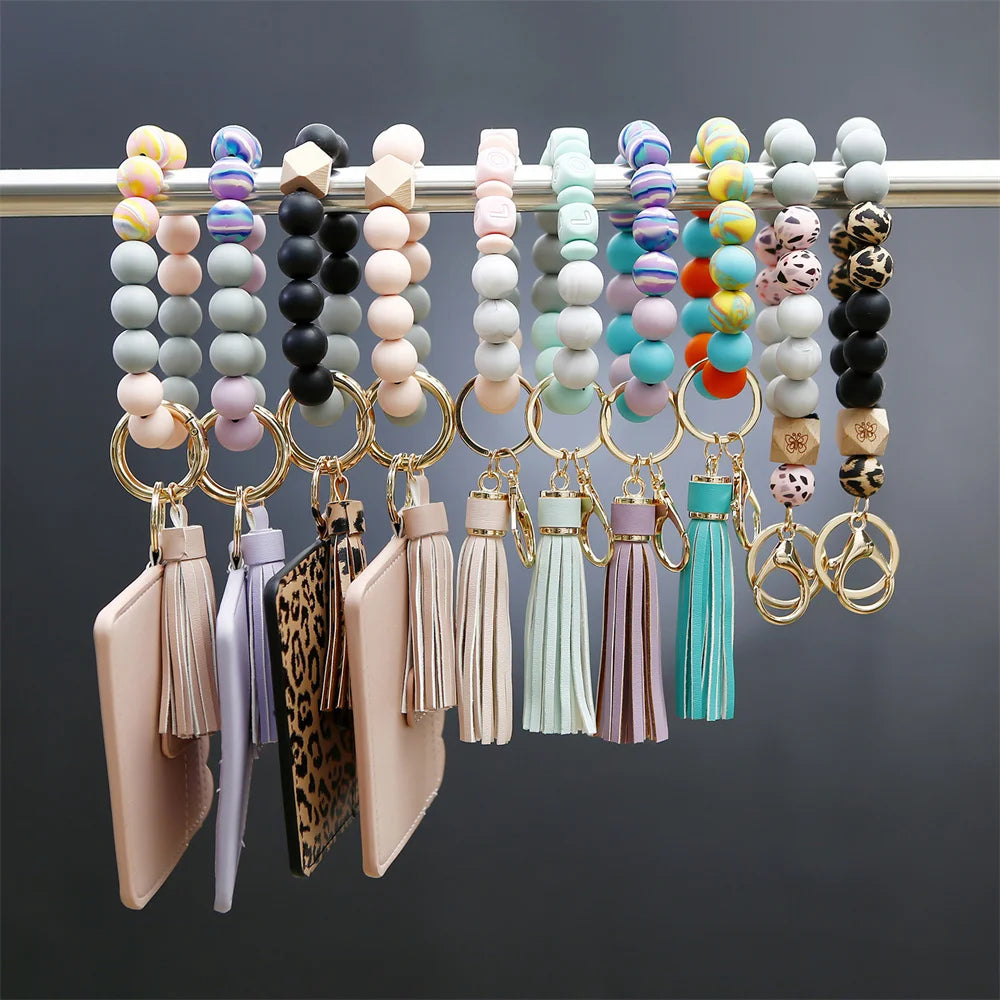 Hemasa Silicone Beads Bracelet With Leopard Print Silicone Bead Bracelet PU Tassel Womens Leather Wallet Key Wrist Keychain Pendant