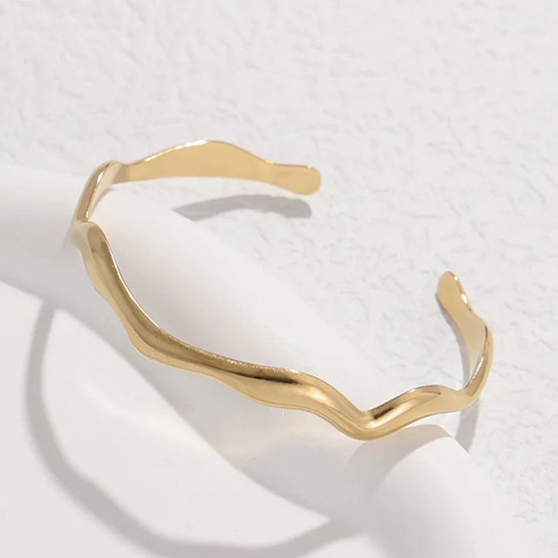 Hemasa  Stainless Steel Wavy C-Shape Cuff Bracelet For Women