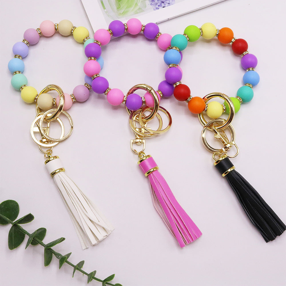 Chic Sunflower Silicone Bead Bracelet with Rhinestone Accents, Tassel Charm & Keychain - Fashionable Women's Accessory